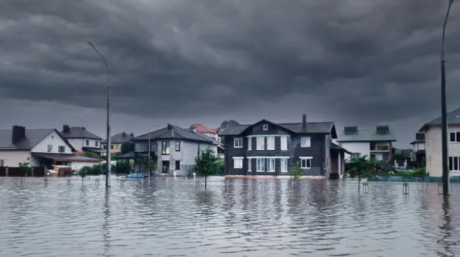 Houses in neighborhood flooded after storm.