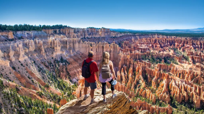 Couple looking at beautiful mountain view.