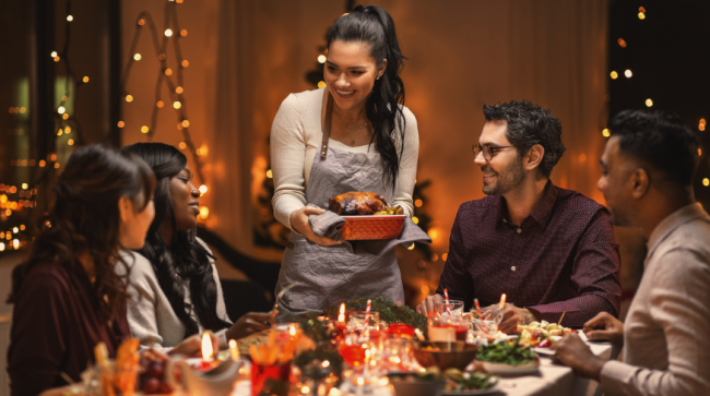 Friends having Thanksgiving dinner together.
